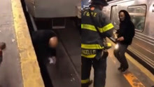 “纽约之最”！男子被压地铁下方 淡定吸烟安全爬出